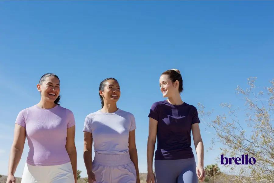 Three women walking representing does metabolism slow with age.